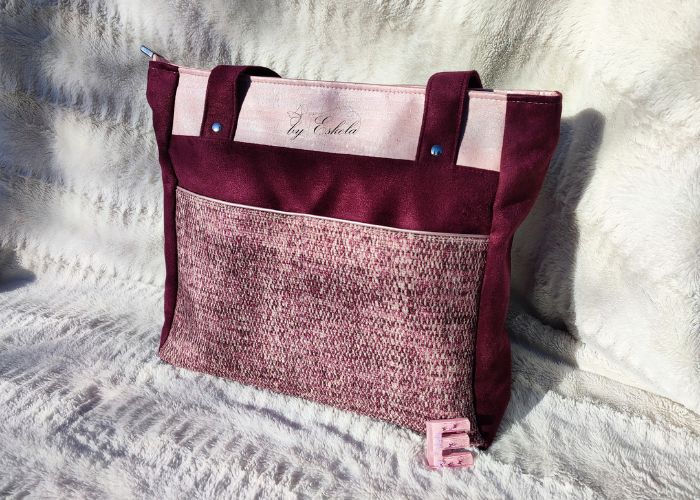 Sac à main Cadence dans les tons bordeau/rose.