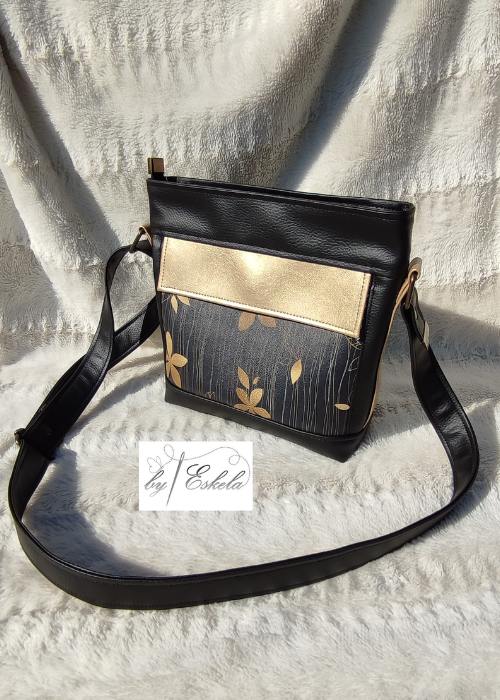 Sac à bandoulière Folk noir et doré avec des motifs de fleurs