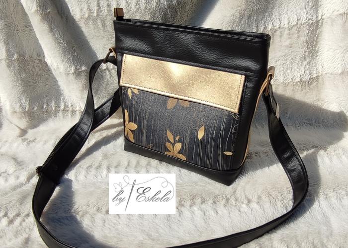 Sac à bandoulière Folk noir et doré avec des motifs de fleurs