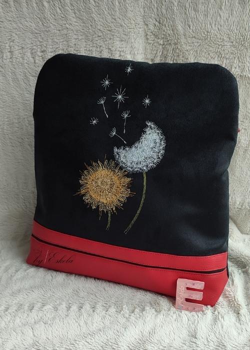Sac à dos Volte noir et rouge avec un motif pissenlit