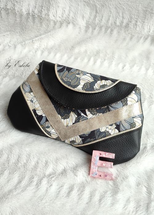 Pochette Emma noire et dorée avec motifs de fleurs