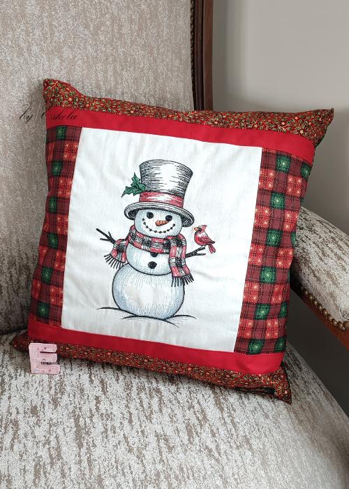 Coussin de Noël avec motif de Père-Noël.